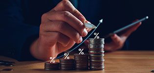 Interest rate and dividend concept. Businessman with percentage symbol and up arrow, Interest rates continue to increase