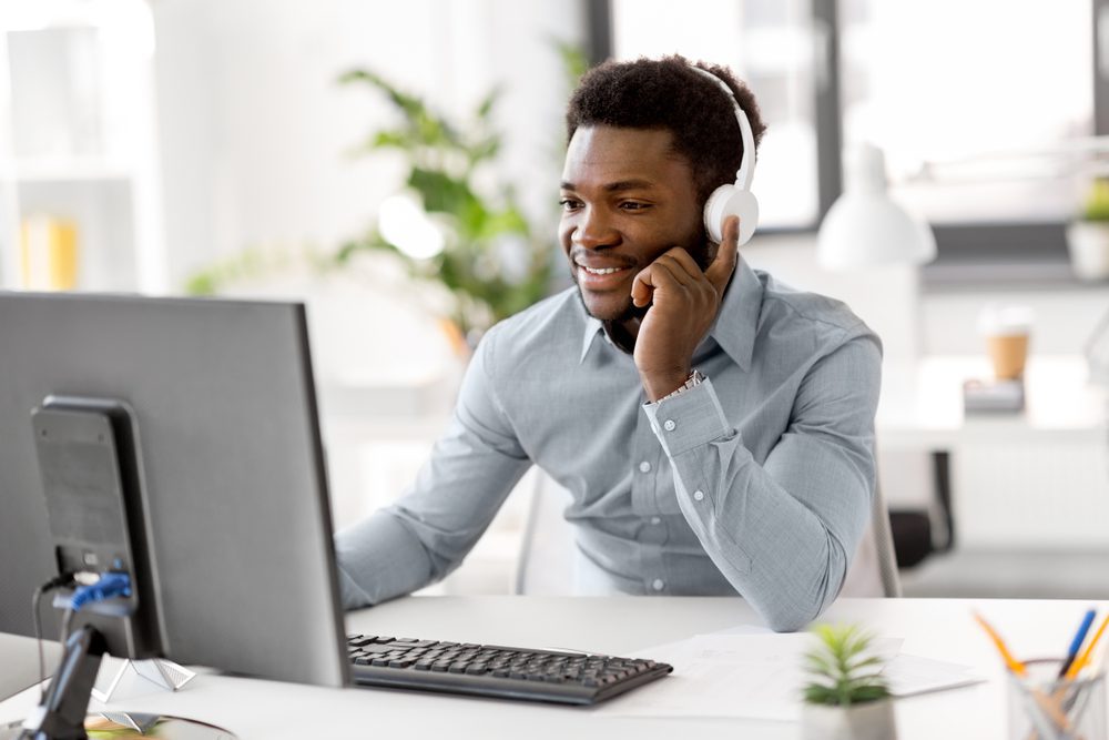 Business,,Technology,And,People,Concept,-,Happy,African,American,Businessman