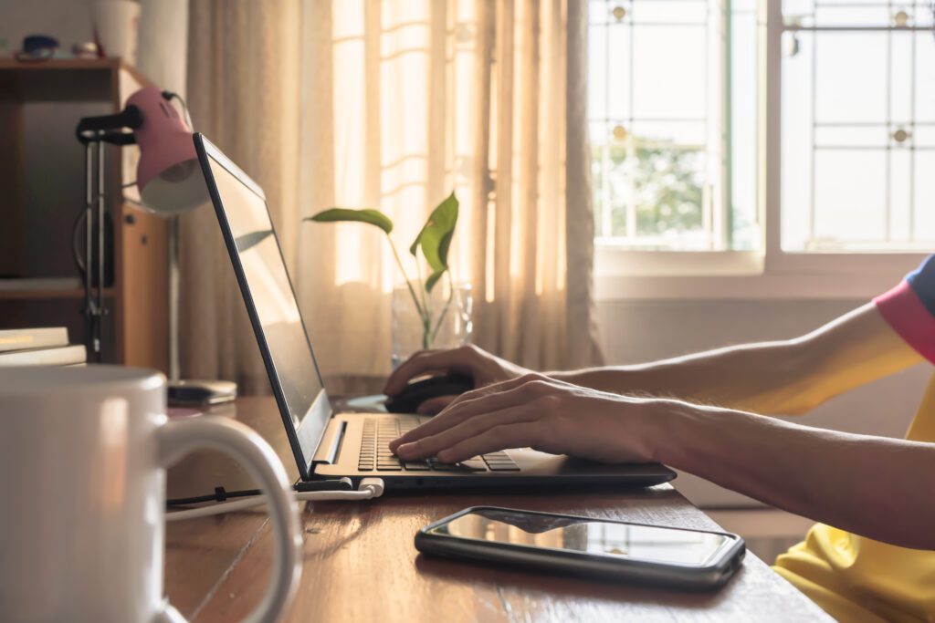 a man working from home using his laptop